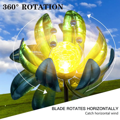 Solar Powered Garden Wind Spinner Light With Blue Lotus Crackle Glass Globe showing blade rotation against blue sky backdrop.