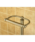 Upgrade Your Bathroom With This Classic Freestanding Pedestal Toilet Paper Holder In Brushed Nickel Featuring A Sturdy Seven And Half Inch Diameter Base And Six Inch Rod For Simple No Tools Needed Assembly. Close-up of the top handle against a tiled wall.