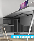 Black cable clips managing wires under a desk, demonstrating cable organization with 50 Pack Medium Self Adhesive Cable Clips Black For Under Desk Car Wall TV PC Ethernet Cables Cable Management And Cord Organizer Holder With Strong 3M Adhesive Nylon.