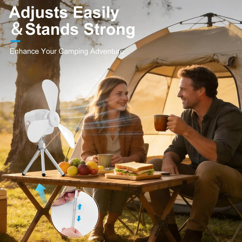 Portable Camping Fan With LED Lights And Remote, 9.25 Inch Wireless Rechargeable Tent Ceiling Fan With Timer, on a picnic table outdoors near a tent.