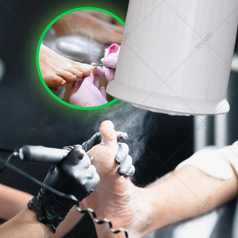 Top Tier Nail Dust Collector Machine With Integrated Lamp And Badass Suction Fan For Manicurists And Home Salon Crews Offering Ten Adjustable Speeds And Ultra Quiet Operation For Crisp Filings in use while filing nails.