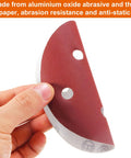 Hand holding a 60Pcs 5 Inch 8 Hole Sanding Discs Set with Hook and Loop Backing 1000/800/600/400/320/240 Grits