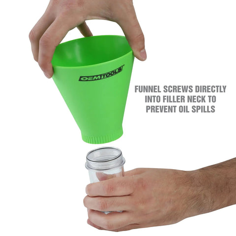 Hands holding No Spill Oil Funnel Kit with green funnel and clear chamber, showing direct-fit for easy oil changes.