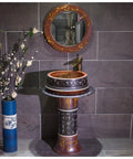 Gotta Have Heavy Duty Round Ceramic Basin Freestanding Sink Slick Polished Finish Zero Sweat Cleanup with round mirror and decor.