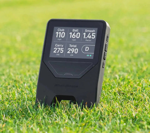 LM1 Portable Mini Launch Monitor For Golfers with real time ball and club speed tracking on grass