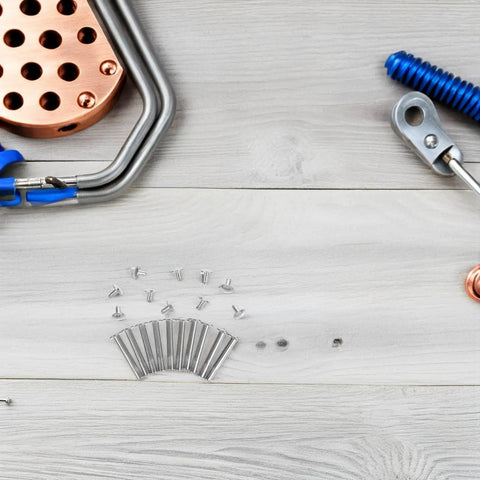 12 Sets Stainless Steel Folding Fan Rivet And Nut Fasteners 25mm Replacement Kit For Easy Repairs On Folding Hand Fans, Durable DIY Fix To Keep Your Fan Running Smooth And Quiet. View of stainless steel fan rivet and nut sets laid out for folding hand fan repair
