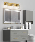 Slick Gold Vanity Light With 3 Lights For Bathroom Over Mirror Modern Wall Sconce With Clear Glass Shades Durable Aluminum Construction 24.5 Inch Long Vanity Lighting Fixture No Bulbs Included