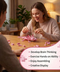 Person assembling Pink Axolotl Building Block Set 998 Pieces 1 To 1 Scale Amphibian Model Kit for Adults and Teens