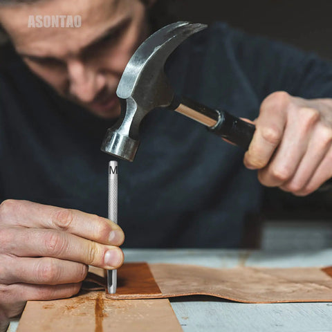 Man using 6 Piece Hollow Leather Hole Punch Set For Belts And Watch Bands, hammering durable carbon steel punch into leather.