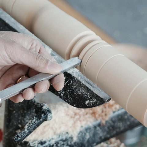 Using Dead On Precision Cryo Treated M2 High Speed Steel Bead Forming Chisel For Wood Lathe on wood with uniform beads.