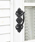 Solid Cast Iron Gate Handles Set 2 Pack Heavy Duty 8.7 Inch Long Barn Door Pulls for Fence Gate on a white door with lace panel.
