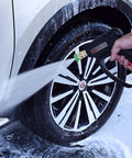 Beefed Up Pressure Washer Gun 5000 PSI Stainless Steel Swivel Inlet spraying car wheel during wash