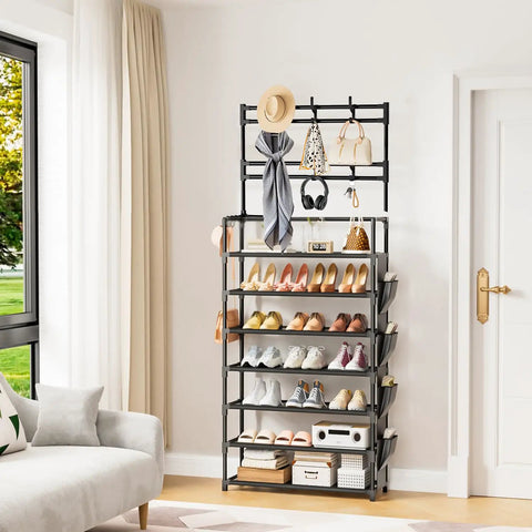 7 Tier Shoe Organizer With Hooks And Side Pocket Freestanding Shoe Rack For Front Door Entryway Holds 21 To 28 Pairs in living room.