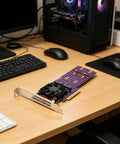 Kickstart Desktop Upgrade With This Dual Bay M.2 NVMe Enclosure Feature PCI Express 4.0 Riser Card on a wooden desk.