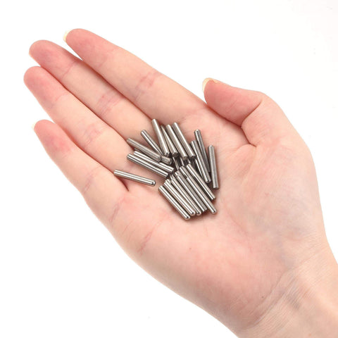 Hand holding 304 Stainless Steel Dowel Pins 3x20mm Round Head Flat Chamfered End 50 Pack for woodworking and furniture use