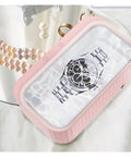 Compact Ultrasonic Cleaning Machine For Sparkling Jewelry, Glasses, Watches, And Delicate Items in pink housing with watch and pearls.