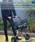 Heavy Duty Garden Hose Reel Cart With Smooth Rolling Wheels in an outdoor setting, sturdy design with ergonomic handle.