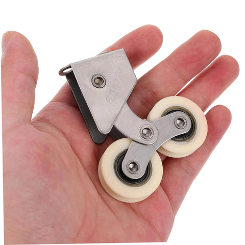 Close-up of 2 Pack Heavy Duty Aluminum Sliding Door Rollers With Stainless Steel Wheels for windows and patio doors in hand