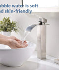 Wide Waterfall Spout Vessel Sink Faucet In Brushed Nickel Tall Above Counter Single Handle Vanity Lavatory Faucet in use