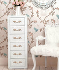 Pack Of 5 European Style Vintage Cabinet Handles And Drawer Pulls on a white dresser in a vintage-themed room