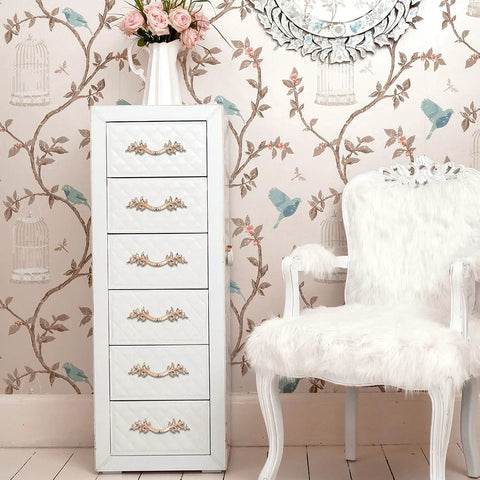 Pack Of 5 European Style Vintage Cabinet Handles And Drawer Pulls on a white dresser in a vintage-themed room