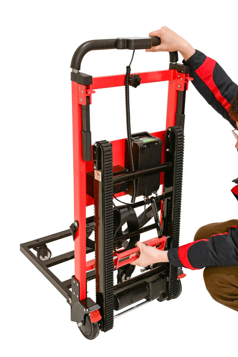 Heavy Duty Electric Hand Truck With 441 Lb Capacity And 160W Motor, user adjusting the handle on a red motorized climbing dolly.
