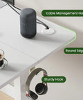Close-up of electric standing desk with memory height adjustment and smooth lift, showing cable hole, round edges, sturdy hook.