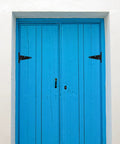 Heavy Duty Extended T Shape Iron Door Hinges with Slotted Ball Bearing Design on a blue door