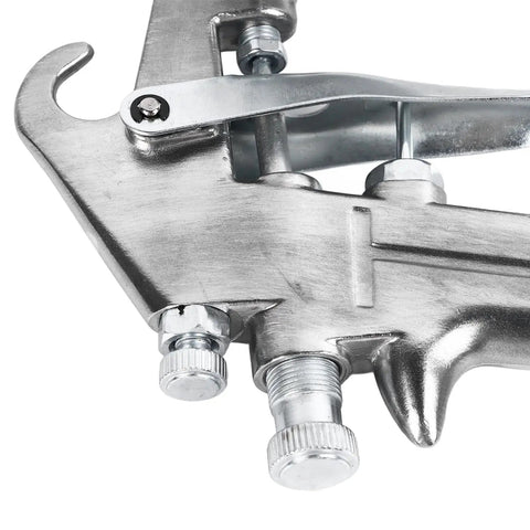 Close-up of Premium High Atomizing Pneumatic Paint Sprayer's metal nozzle and controls for precise furniture refinishing.