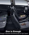Inside view of car showing Top Shelf 90 Watt Five Port Usb C Car Charger With Dual Pd 30 W Quick Charge Ports in use.