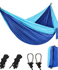 Ultra Lightweight Parachute Nylon Hammock With Tree Straps For Camping Backpacking Hiking Or Beach Adventures Single Or Double Setup 500 Lb Capacity Ultra Compact And Portable No Stand Blue with carabiners and straps.