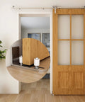 Stainless Steel Barn Door Floor Guide With Adjustable Ball Bearing Bottom Guide Wall Mount For Smooth Sliding Non Scratch Heavy Duty Sliding Door Hardware For Interior And Exterior Use installed on wooden barn door in living room.