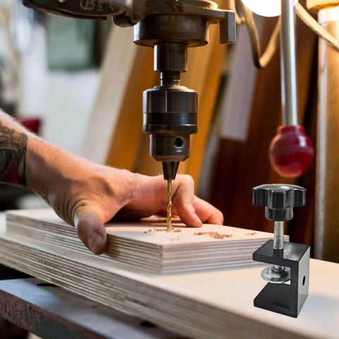 Set Of 4 Heavy Duty C Clamps For Woodworking And Metalworking shown in use on a wooden board under a drill, rust resistant black aluminum alloy.