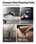 Cordless Electric Spin Scrubber with eight replaceable brush heads cleaning sink, wall, floor, and sofa in bathroom.