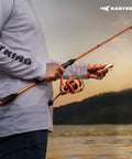 Angler holding rod with Lethal Blaze Spinning Fishing Reel With Ultra Smooth Drag And 5 Point 2 To 1 Gear Ratio CNC Aluminum Spool