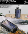 Rugged 8000mAh Solar Charger Power Bank For Outdoor Adventures on a table, showing USB C charging and solar panels.