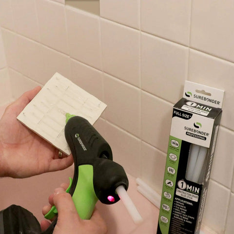Using construction grade adhesive hot melt glue sticks for tough jobs on a tile, full size 10 inch by 0.43 inch, 1 minute bond