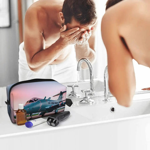 Aircraft Print Travel Cosmetic Bag Large Dopp Kit for Makeup and Toiletries on bathroom counter near man washing face
