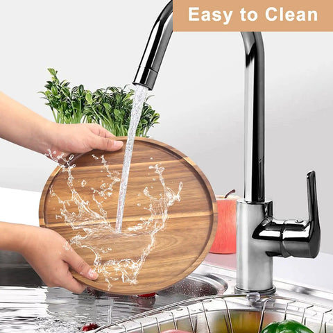 12 Inch Round Acacia Wood Serving Tray Super Sturdy Natural Kitchen Counter Dish Holder Lazy Susan being rinsed under water.
