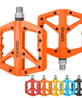 Ultra Lightweight Mountain Bike Pedals With Grippy Traction For Trail And BMX Rides Platform Pedals Nine Sixteenth Inch Axle Nylon Fiber Build Durable And Lightweight Orange, shown in multiple colors.