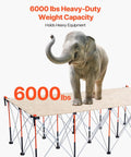 Portable Folding Workstand with 6000 lbs capacity, shown supporting an elephant, for garages and workshops, no assembly required.