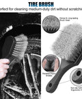 Tire brush from All In One Pro Grade Wheel And Tire Detailing Kit with ergonomic handle shown cleaning wheel and tire