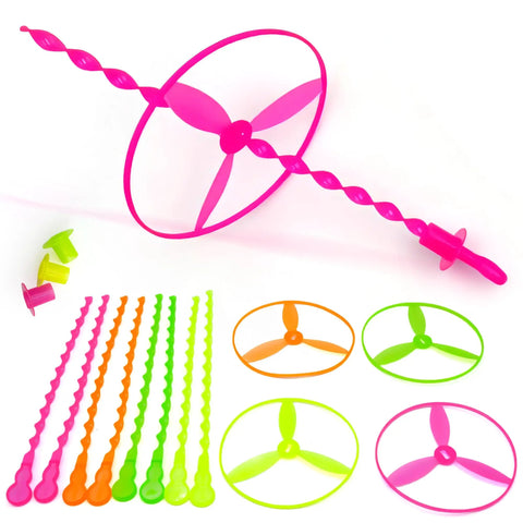 50 Pack Flying Disc Toy Set With Swirly Sticks, Spinners, And Rings, pink and green discs with colorful swirly sticks