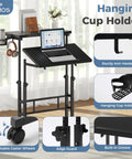 Split Top Rolling Standing Desk With Adjustable Height From 28 To 45 Inches Manual Lift Mobile Laptop Desk On Wheels Sit Stand Office Table For Home Office Black with laptop on top