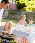Family using Six Pack Mesh Food Covers 17x17 Inches Pop Up Patio Net For Outdoor Dining White Nylon Bug Screen Tents For Picnics