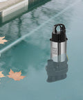Heavy Duty Submersible Sump Pump With Rock Solid Stainless Steel Body in water with leaves, ideal for drainage.