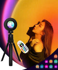 Sunset Lamp Projector with Remote 13 Color Multicolor Night Light for Bedroom Vibe projecting on wall with remote control