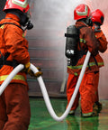 Firefighters using Heavy Duty Lay Flat Fire Hose 1.5 Inch By 100 Feet White Backwash And Discharge Hose With Brass NPSH NPT Connectors.