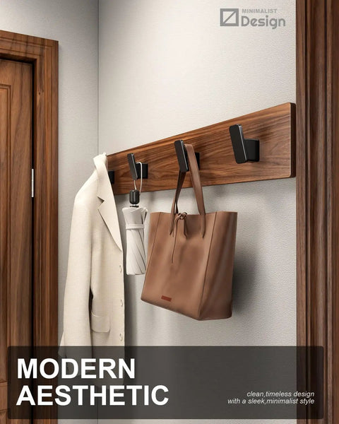 4 Pack Matte Black Towel Hooks For Bathroom And Mudroom Heavy Duty Wall Mounted Hooks with coat and bag on wood panel