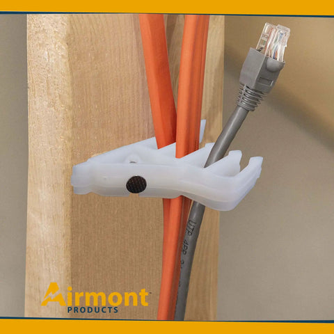 Airmont White Cable Stackers 50 Pack Multiple Cable Separator Wire Organizer holding multiple cables on wooden stud framing.